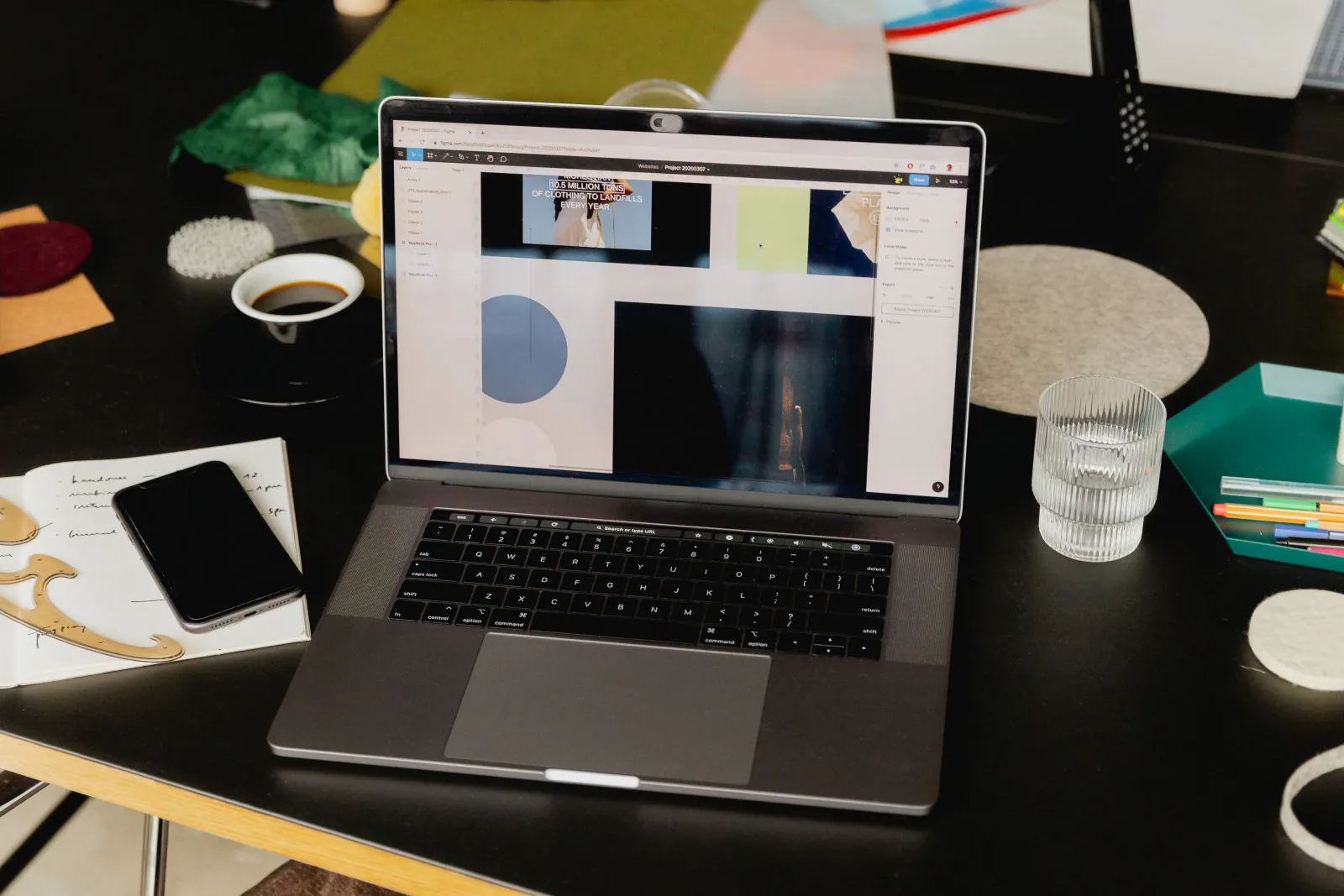 An open laptop on a desk, a website design taking shape